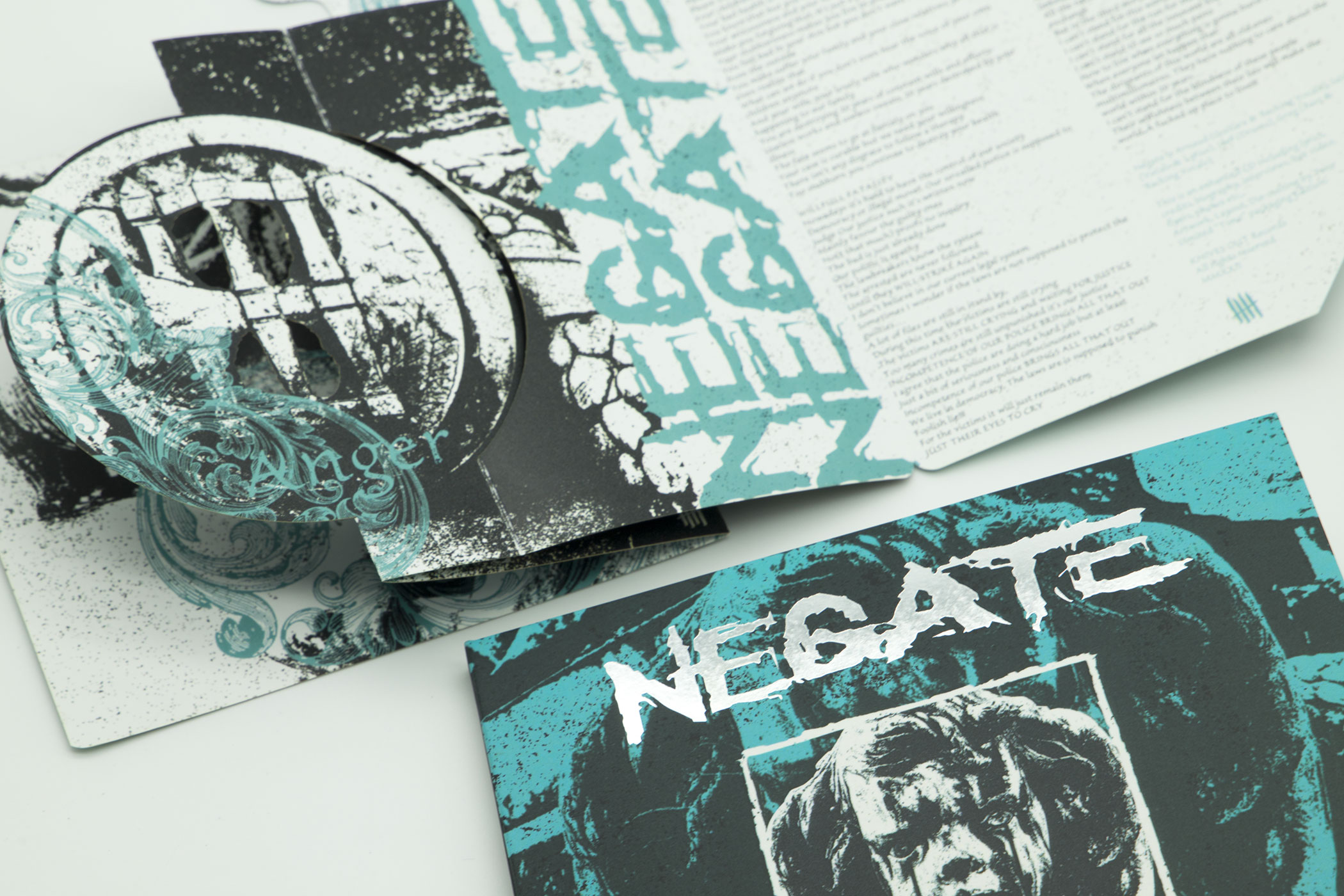 NEGATE "Between Anger and Pain" die-cut Digipack enhanced CD